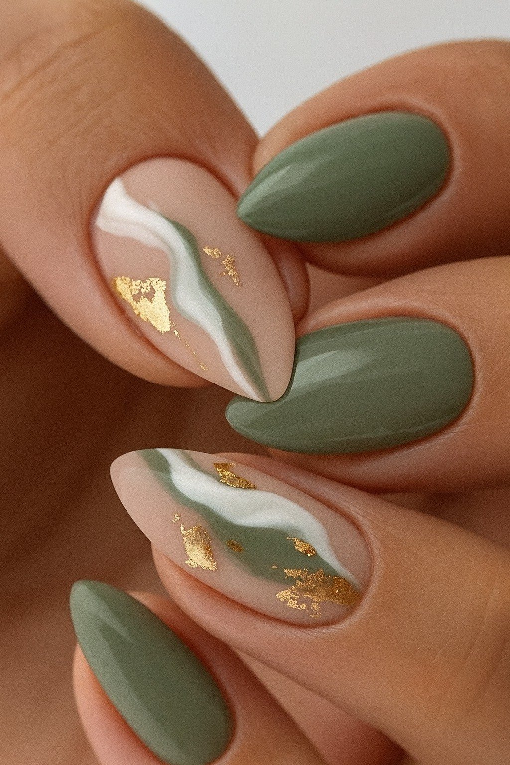 Olive Nails with White and Gold Marble Accents for women over 50 - olive green nail idea 27