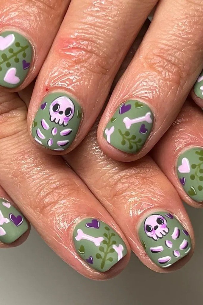 Olive Nails with Halloween Skull Art for women over 50 - olive green nail idea 65