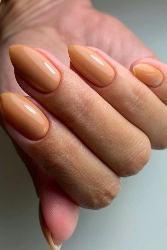 Rich caramel brown almond nails - caramel nude nail idea for women over 50