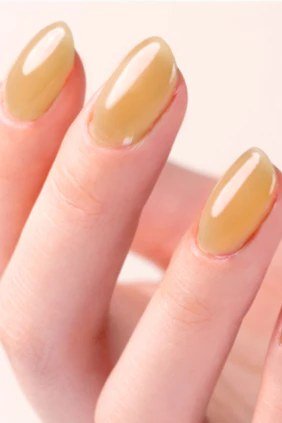 Honey caramel glossy almond nails - caramel nude nail idea for women over 50