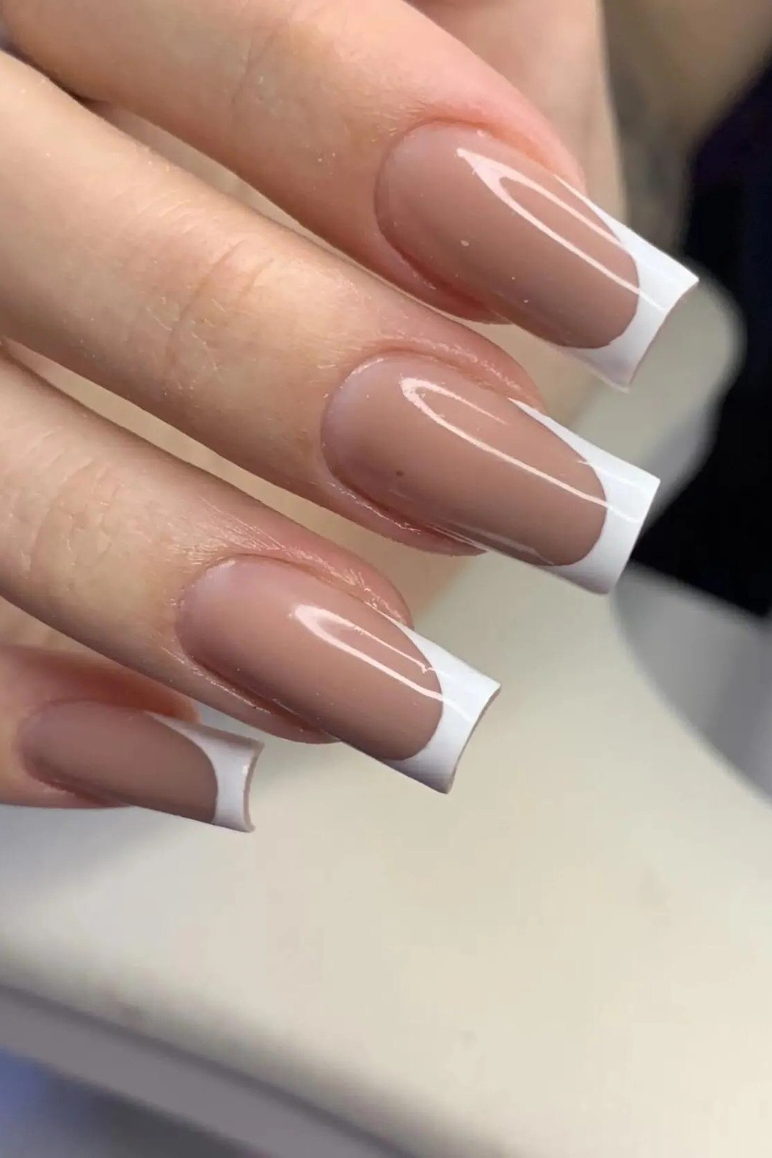 Brown caramel french tip nails - caramel nude nail idea for women over 50
