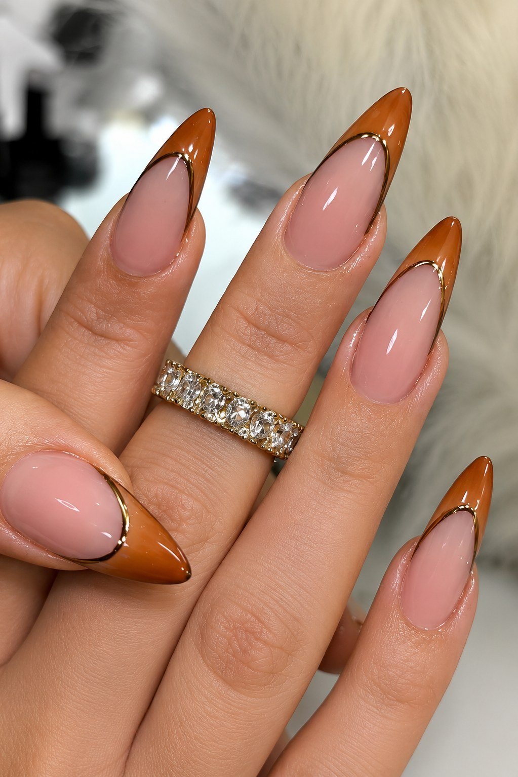 Pink caramel french-tip almond nails - caramel nude nail idea for women over 50