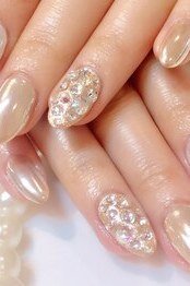 Pearl nails with rhinestone and pearl accents for women over 50