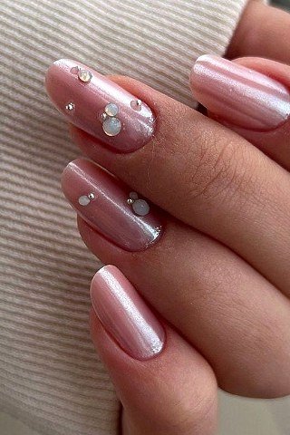 Mauve pearl nails with scattered pearl dots for women over 50