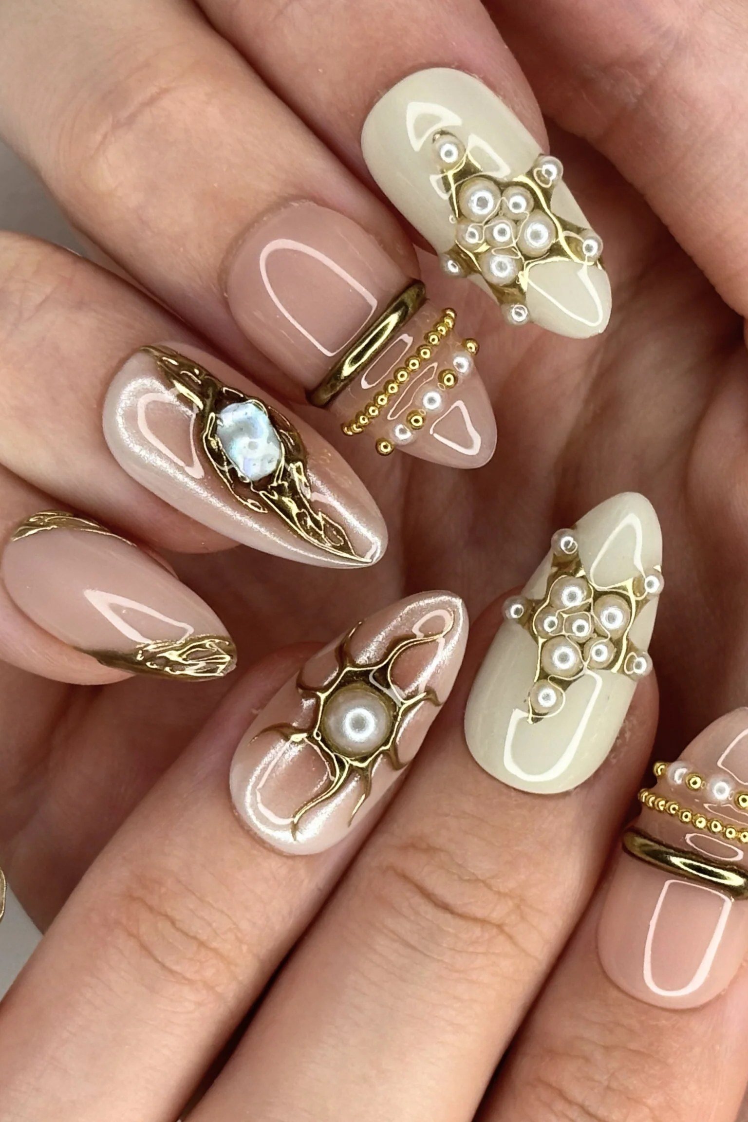 Pearl nails with gold pearl clusters for women over 50