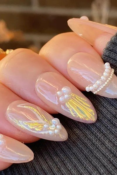 Pearl nails with gold foil and pearl beads for women over 50