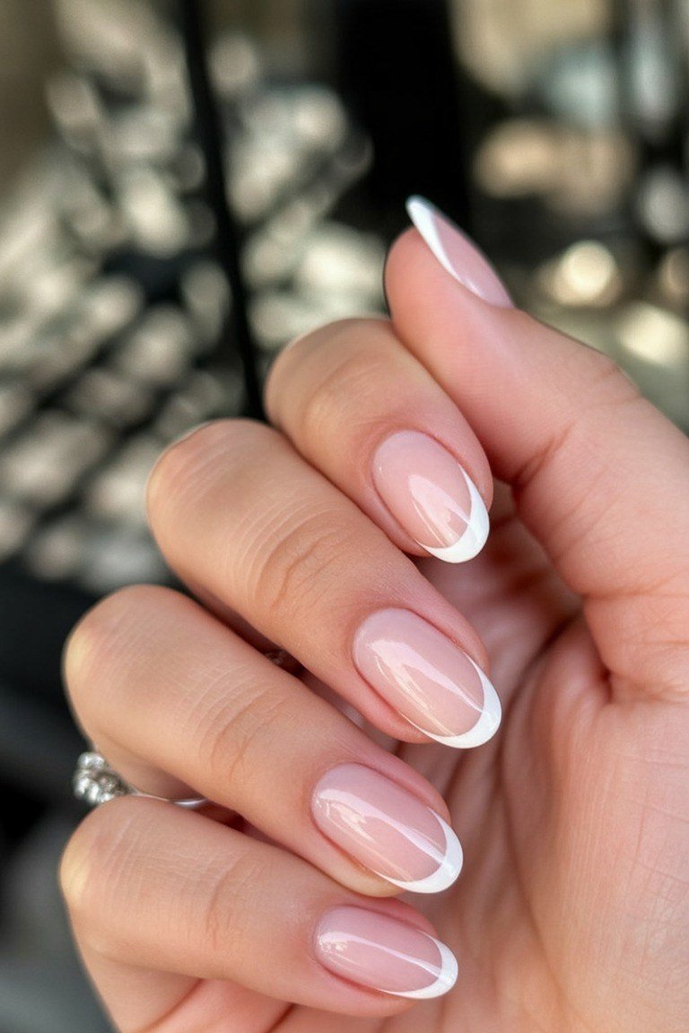 Almond french pink-tipped - flattering nail idea for women over 50