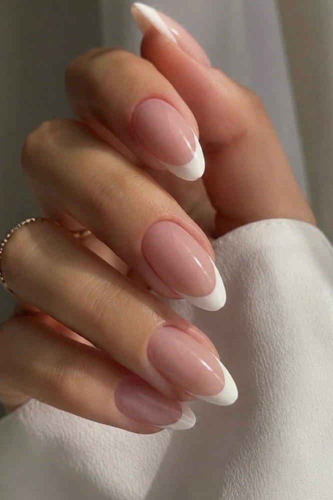 Almond french tip with white cuff - flattering nail idea for women over 50