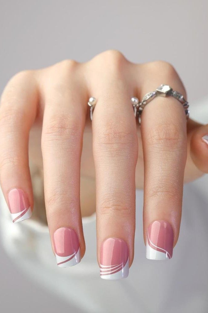 Pink french tip with glitter accent nail - flattering nail idea for women over 50
