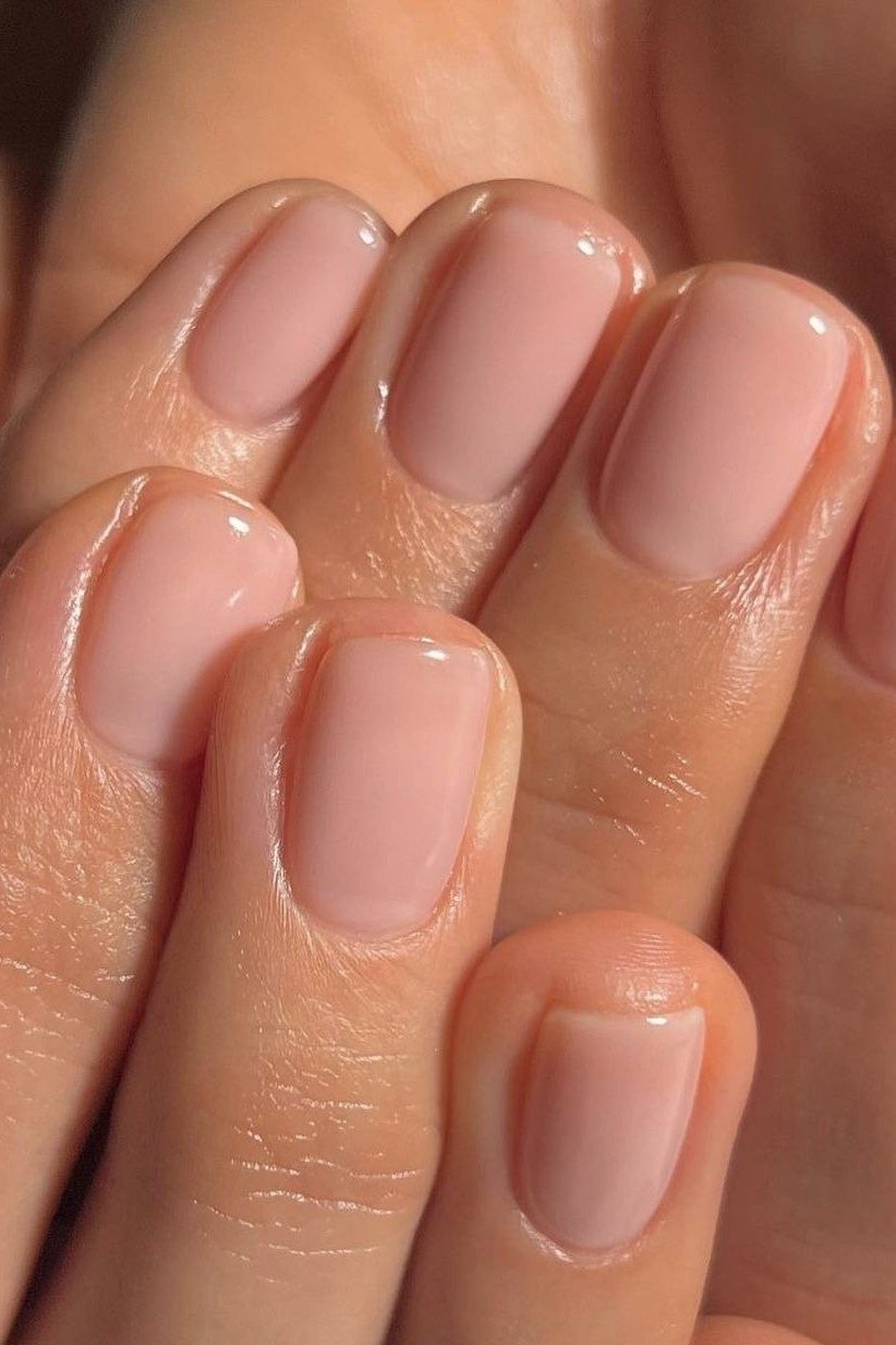 Dusty rose short nails, both hands - flattering nail idea for women over 50
