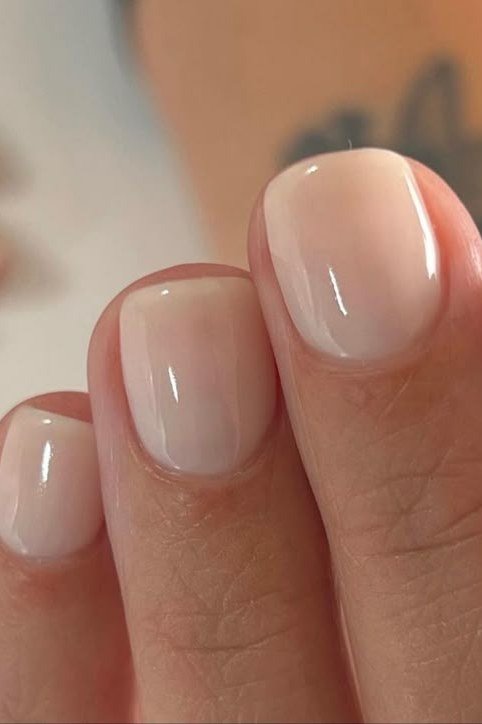 Short round sheer pink nails glossy for women over 50