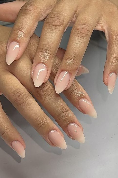 Medium almond nude nails glossy two hands for women over 50