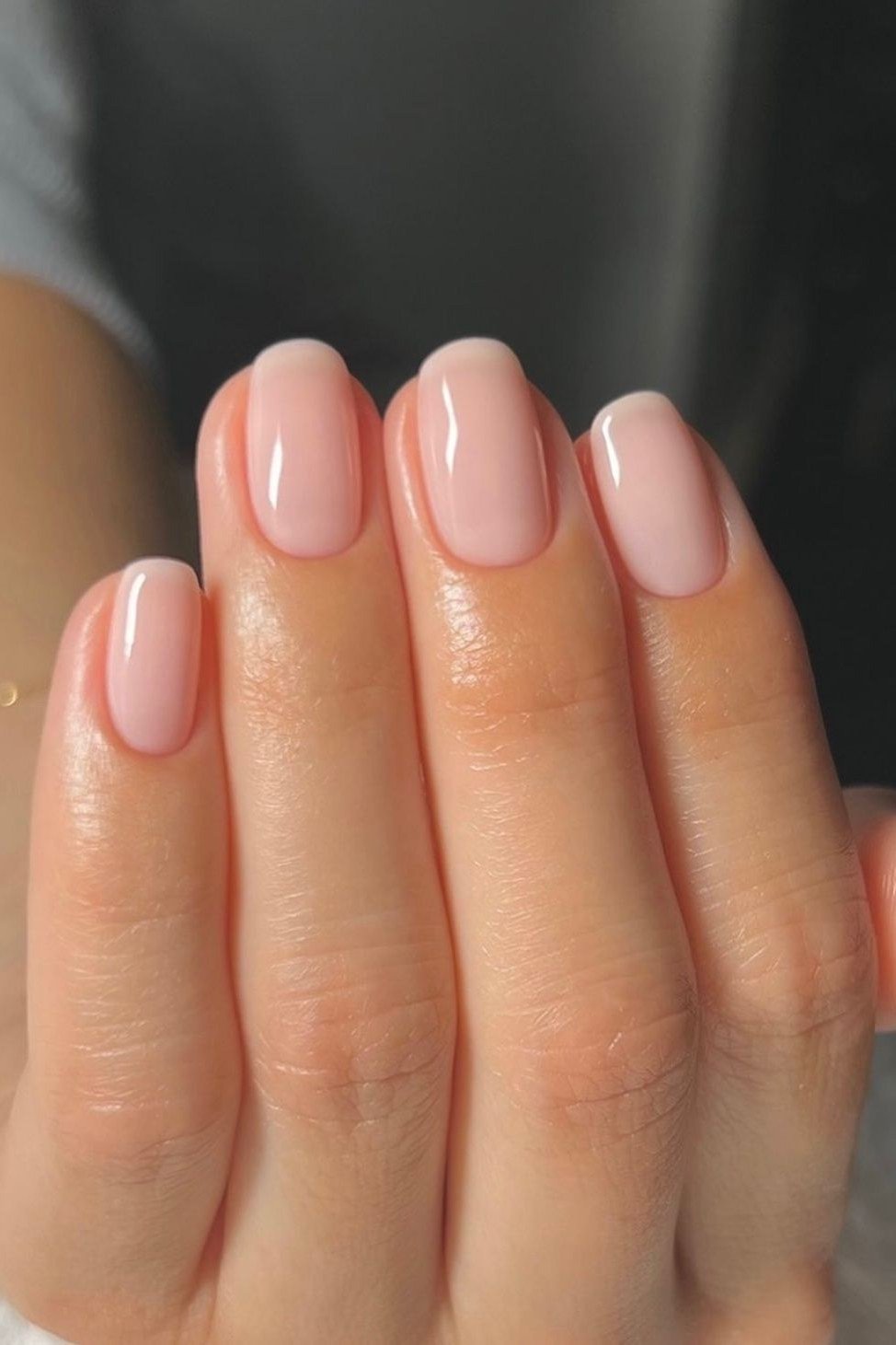 Soft pink nude oval nails glossy for women over 50