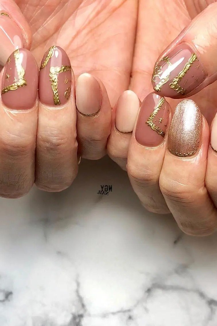 Mauve with gold swirl art - nail art for women over 50