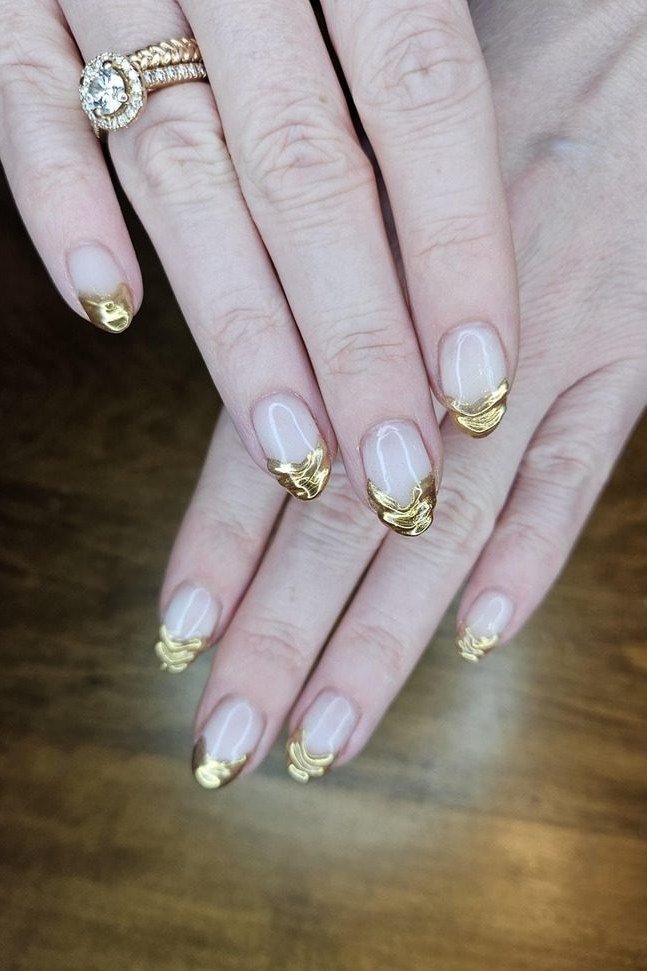 White with gold chrome french tips, mature hands - nail art for women over 50