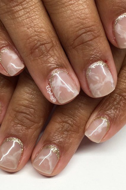 Milky marble with gold tips, deeper skin tone - nail art for women over 50