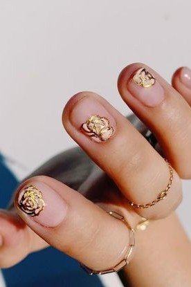 Nude with gold 3D flower art - nail art for women over 50