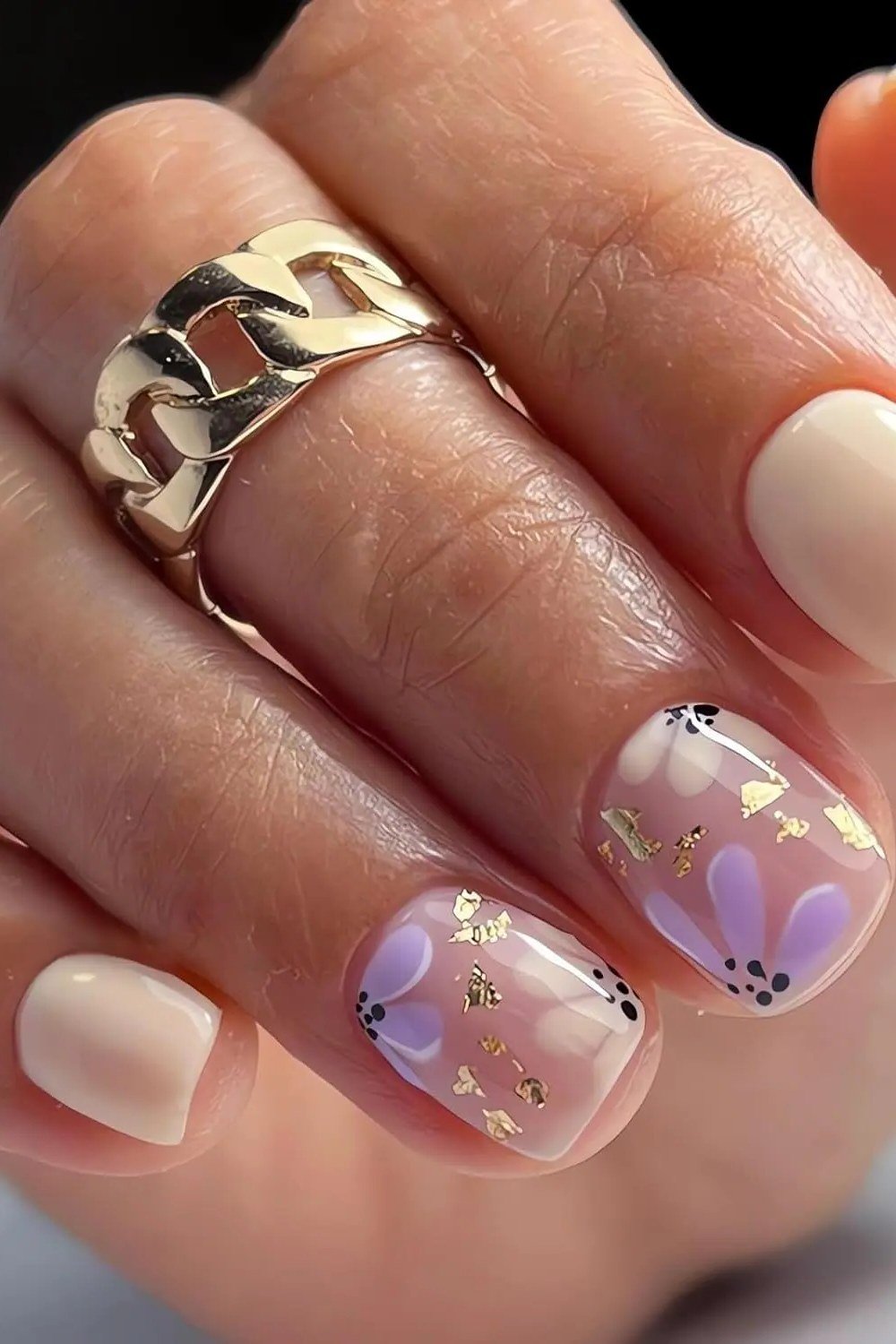 Nude with purple and gold floral art - nail art for women over 50