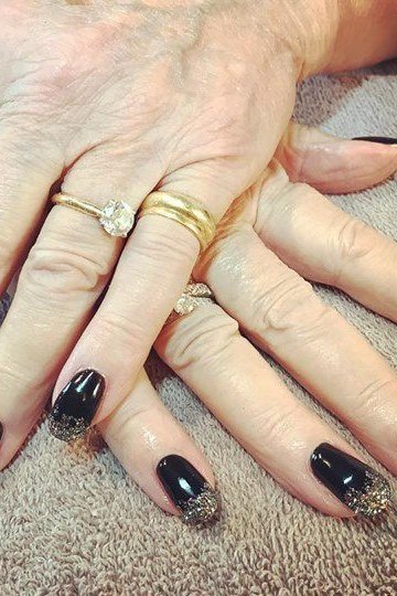 Black with silver glitter tips, old hands - nail art for women over 50