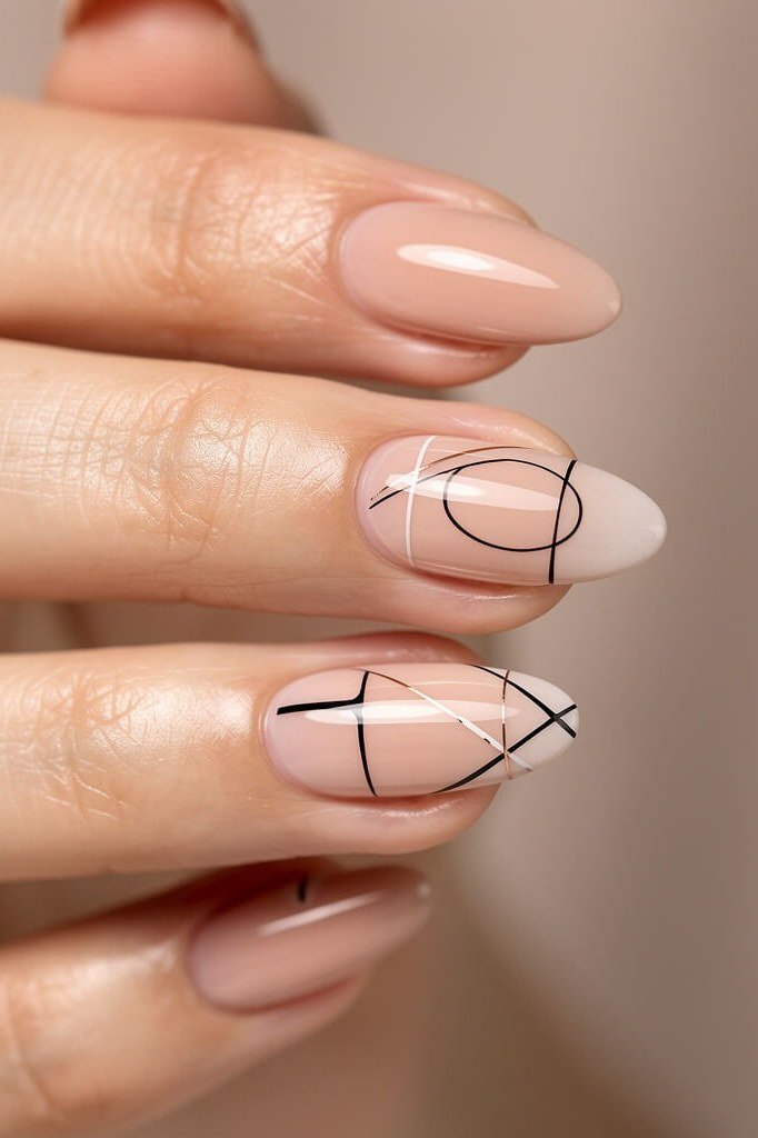 Nude almond nails with black abstract line art