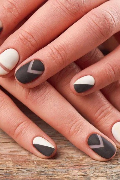 Matte black and white geometric color-block square nails