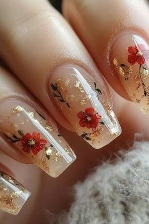 Clear nails with red floral and gold foil art, almond