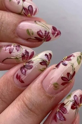 Pink almond nails with deep burgundy floral art