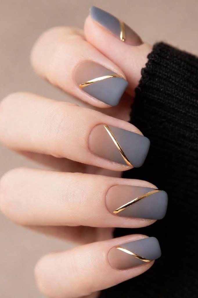 Matte gray nails with gold line art