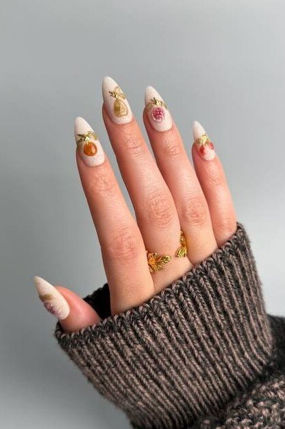 Nude nails with gold leaf foil accents