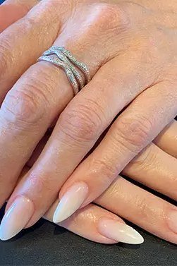 Long white French tips with a salon-perfect finish for older women
