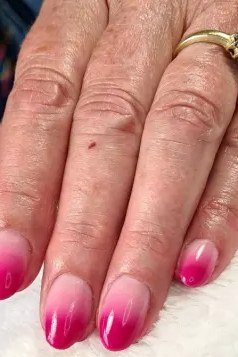 Hot pink ombre French tips for women over 50