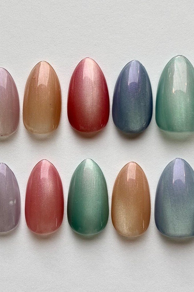 Pastel cat-eye jelly nail tips set, mint peach lavender, on gray card - jelly nail idea for women over 60
