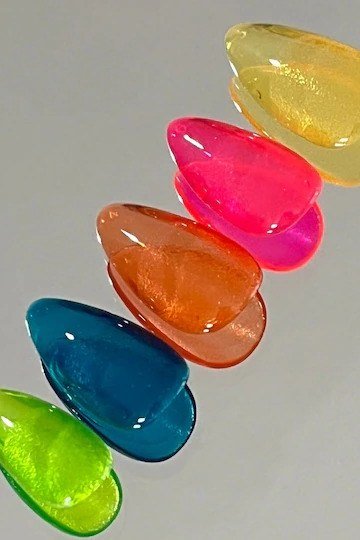 Neon rainbow jelly nail tips, yellow pink orange blue green candy colors - jelly nail idea for women over 60