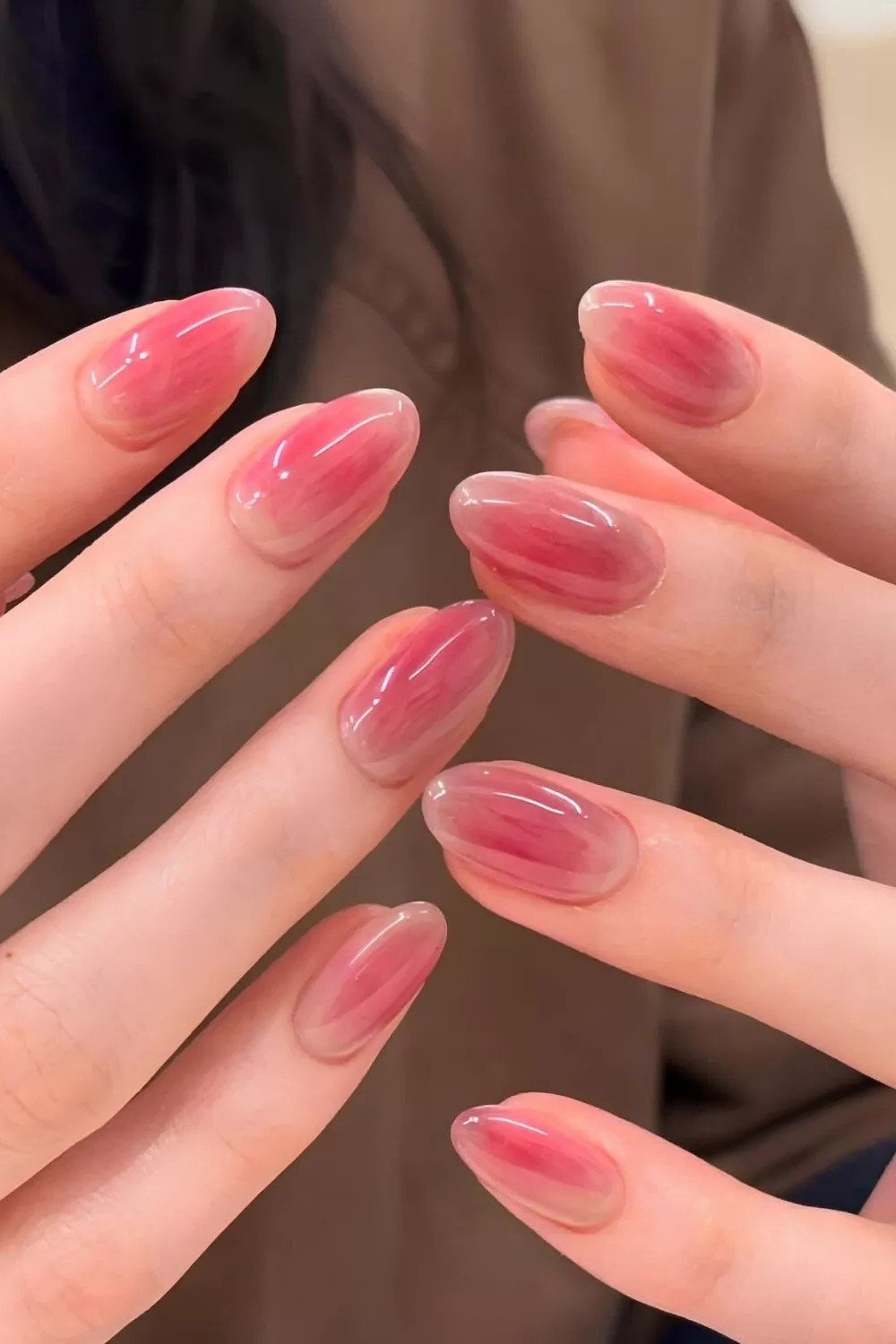 Pink jelly nails with darker pink gradient tips - jelly nail idea for women over 60