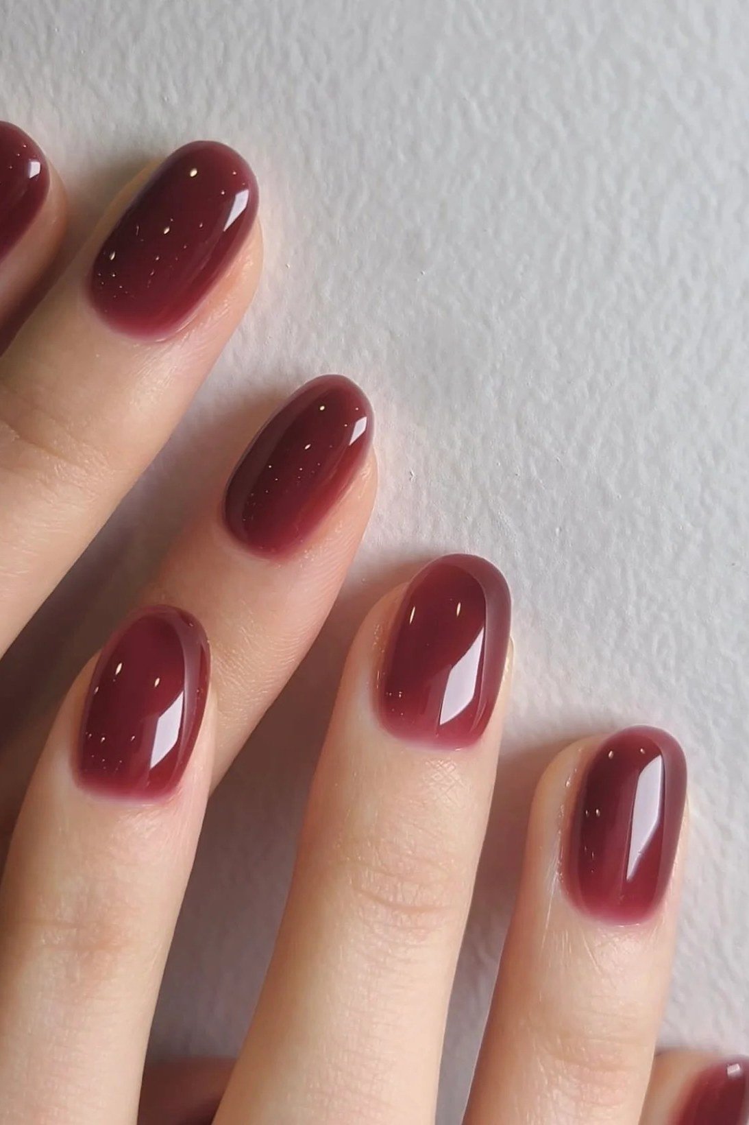 Deep wine red jelly nails, oval - jelly nail idea for women over 60