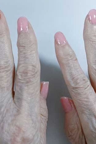 Pale pink sheer jelly nails on hands, soft natural - jelly nail idea for women over 60