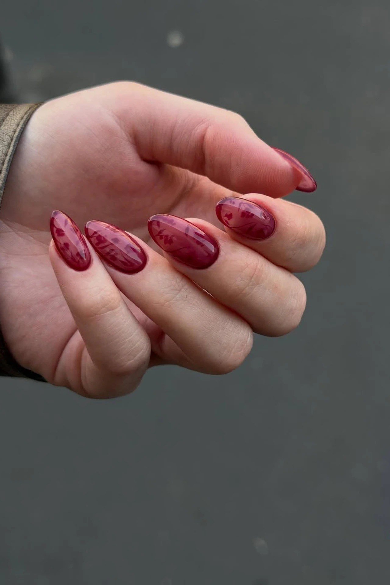 Burgundy jelly nails, almond, deep glossy - jelly nail idea for women over 60