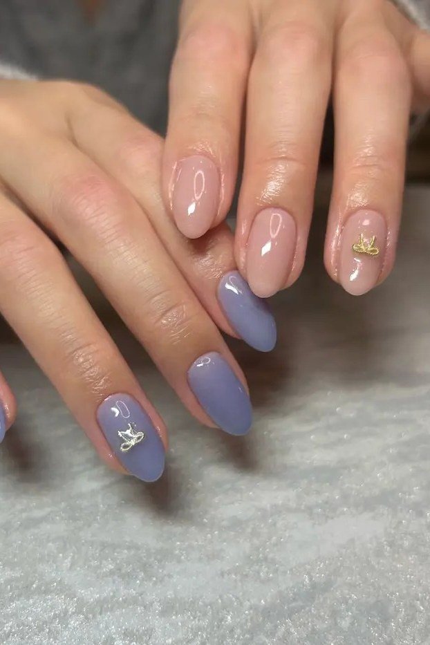 Periwinkle jelly nails with small flower nail art - jelly nail idea for women over 60
