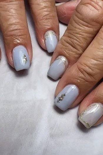 Grey Marble with Gold Flecks - marble nail design for women over 60