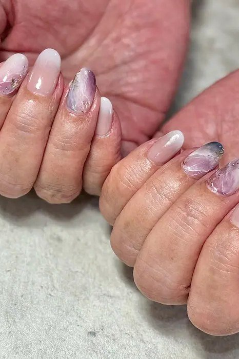 White Nails with Marble Accents - marble nail design for women over 60