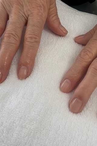 Two aged hands with ring, natural clear for women over 60 - simple clear nail idea 11