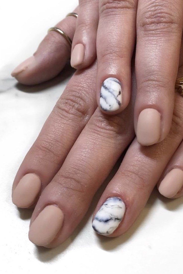 Matte Nude with a Marble Accent Nail - marble nail design for women over 60