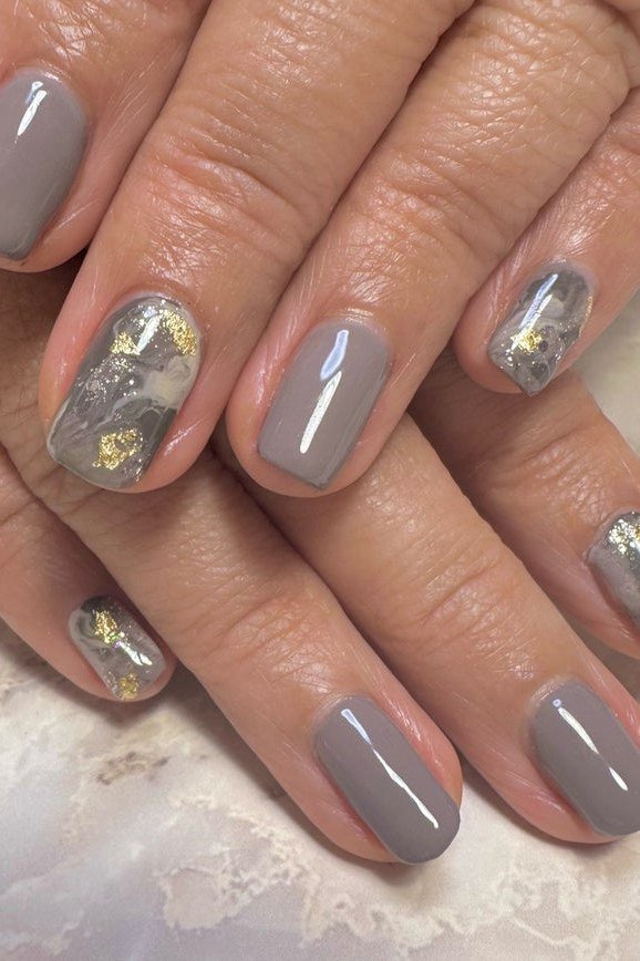 Nude Marble with Gold Accents for Mature Hands - marble nail design for women over 60