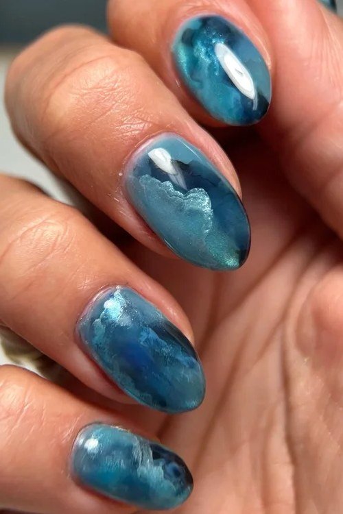Teal Water Marble Almond Nails - marble nail design for women over 60