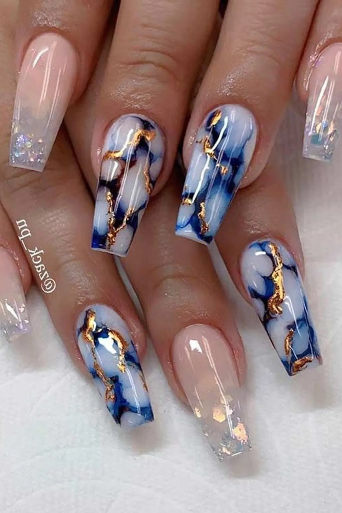 Blue and Gold Marble Accents on Nude - marble nail design for women over 60