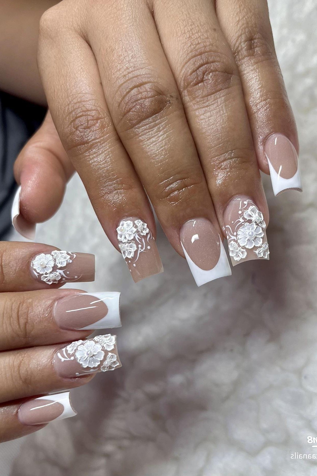 Nail art design for women over 60: white french tips with lace nail art