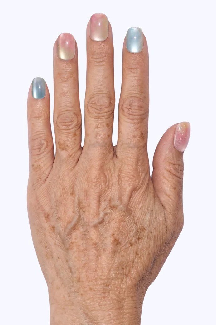Aged hand, blue and gold tipped nails for women over 60 - simple clear nail idea 69