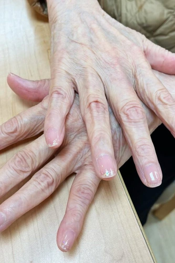 Sheer pink wash on aged hands