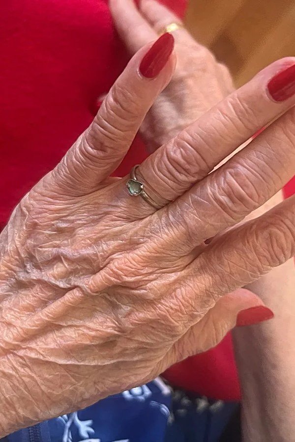 Long oval rich red manicure elegant for women over 60