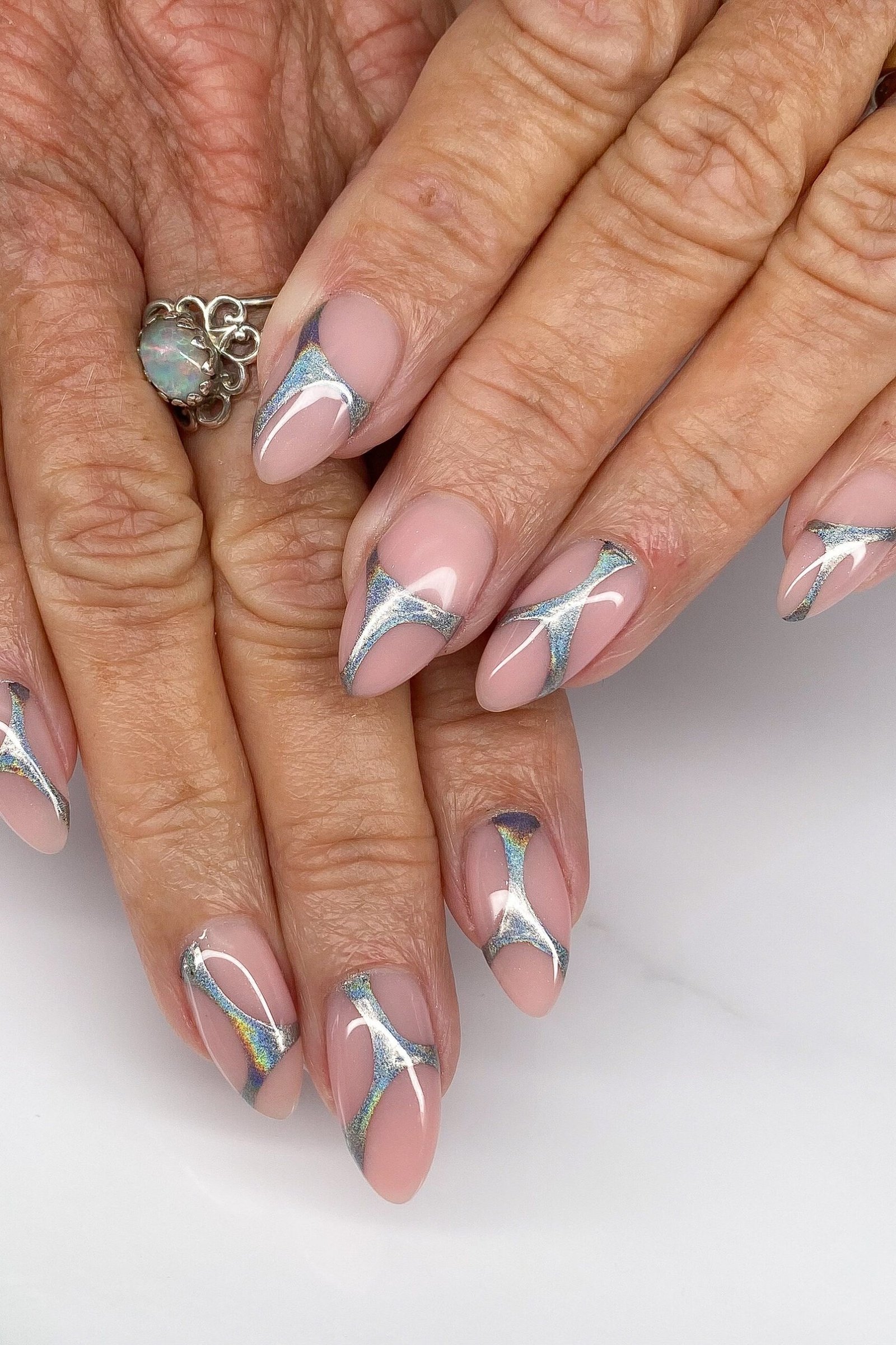 Pink Nails with Silver Chrome Swirl Accent - manicure idea for women over 40